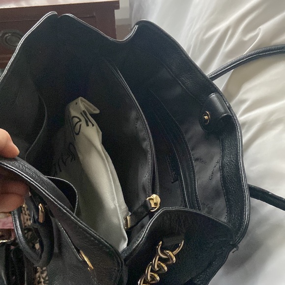 Calvin Klein used black leather bag.  Two short straps and one long strap. - Picture 3 of 4